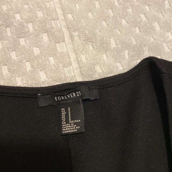 Little black dress with cutouts - Picture 3 of 3